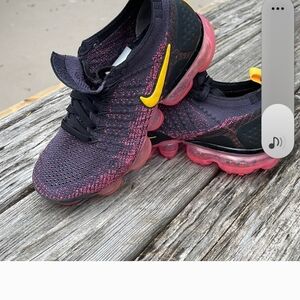 Black and Pink Sneakers with Yellow Swoosh